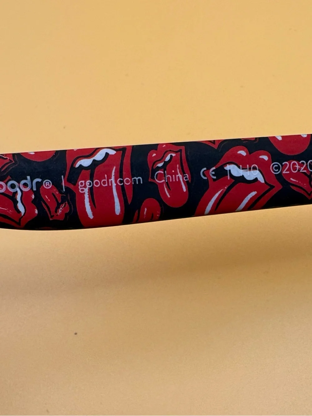 Rolling Stone Sunglasses with Red Patterned Temples with matching pouch